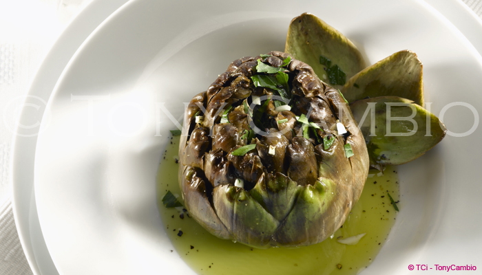 An Artichoke on a White bowl
