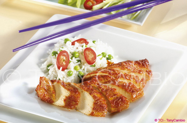 Succulent chicken with rice and peas.