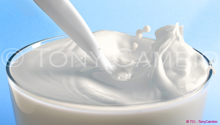 Milk being poured into a glass